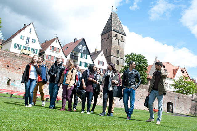 Group of students in front of the city wall in Ulm